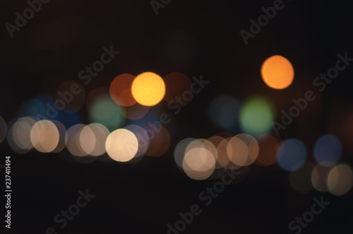 abstract light blur bokeh background celebration merry christmas and happy new year holiday. © thithawat