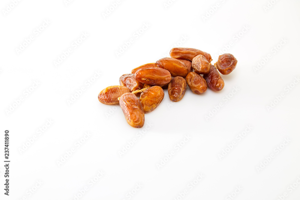 Obraz premium Date fruits over white background