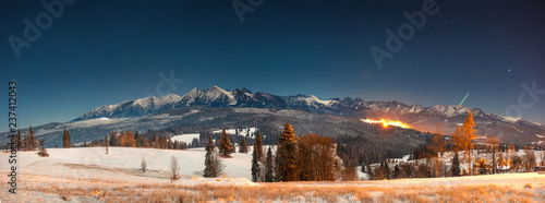 Panoramic mountains landscape at winter night in Tatra