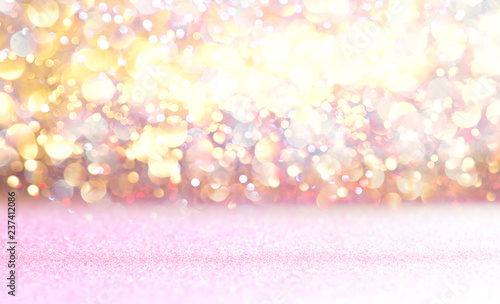 Pink glitter lights background. defocused