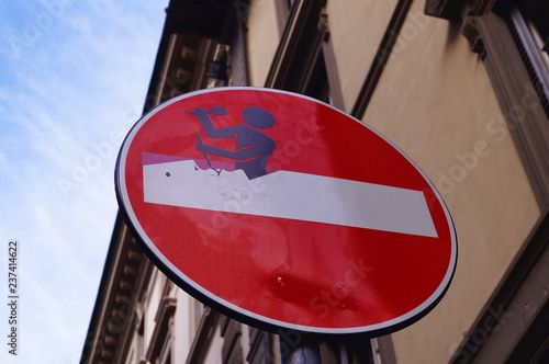 Road sign changed in Florence Italy