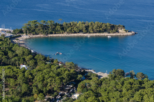 View of the sea Bay from the mountain, the shore and the protruding Peninsula with trees