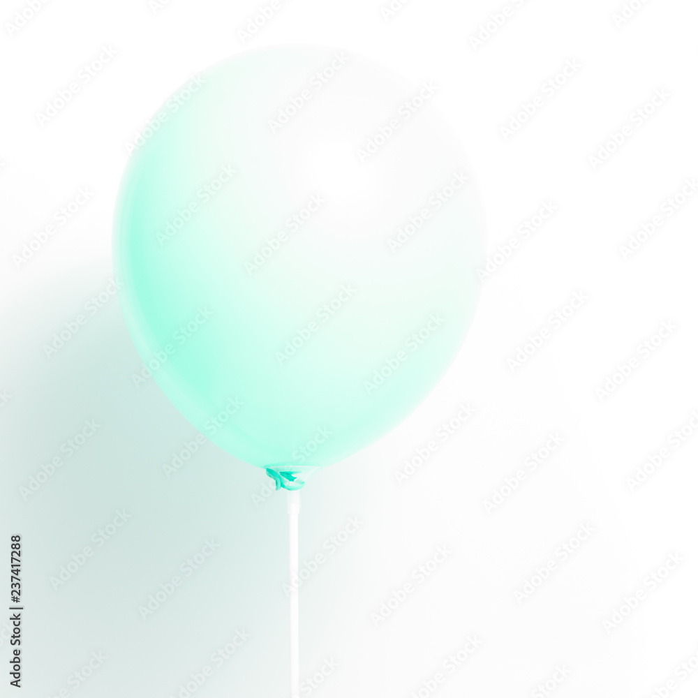 Green balloon on white background with shadow. Strong light. Green balloon on white background with shadow. Strong light.