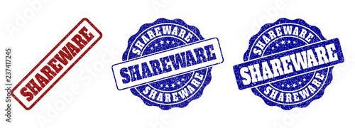 SHAREWARE grunge stamp seals in red and blue colors. Vector SHAREWARE imprints with grunge effect. Graphic elements are rounded rectangles, rosettes, circles and text tags.