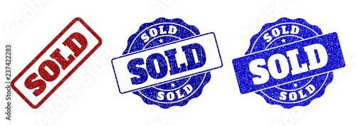 SOLD scratched stamp seals in red and blue colors. Vector SOLD watermarks with grunge effect. Graphic elements are rounded rectangles, rosettes, circles and text tags.