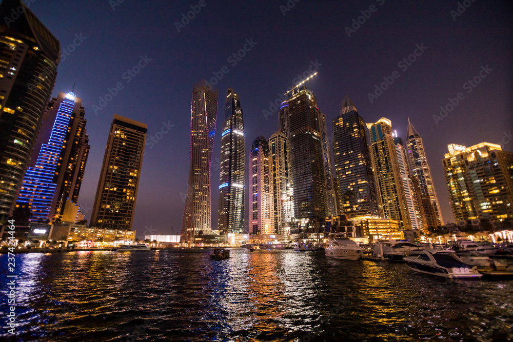 Fototapeta premium Dubai, UAE - October, 2018. Skycrapers at Dubai Marina. Dubai marina at night night cityscape lights