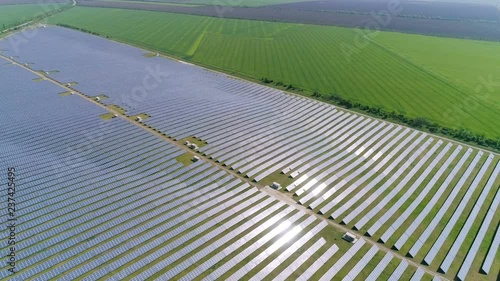 Aerial shot of triangular solar thermal station in Odessa region in summer photo