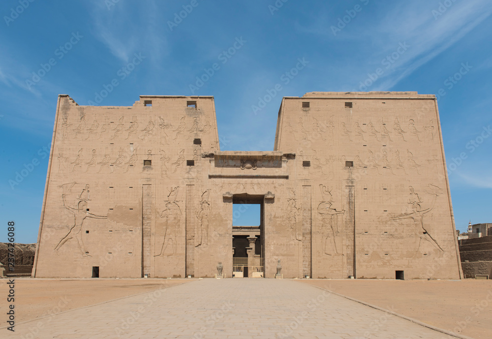 Hieroglyphic carvings on an ancient egyptian temple wall Hieroglyphic carvings on an ancient egyptian temple wall