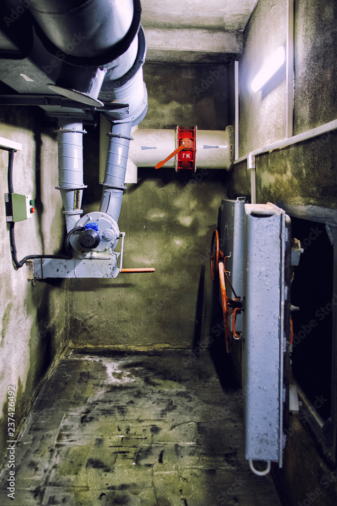 The industrial air ventilation system with supply fan in underground bomb  shelter Stock Photo | Adobe Stock