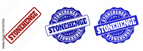 STONEHENGE grunge stamp seals in red and blue colors. Vector STONEHENGE labels with grunge texture. Graphic elements are rounded rectangles, rosettes, circles and text labels.