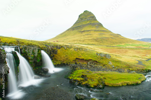 Kirkjufell Mountain  Iceland  Landscape with waterfalls  long exposure in a cloudy day  Snaefellsnes peninsula