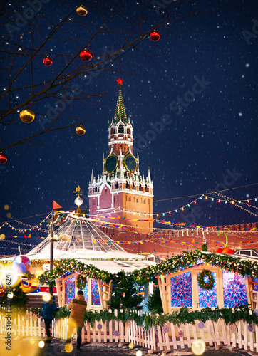 Christmas Fair on Red Square in Moscow. View of Kremlin tower.