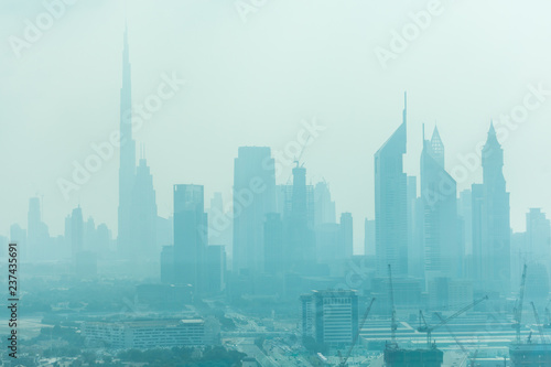 Dubai  UAE - October  2018. Beautiful skyline of Dubai surrounded by sand dust at day light
