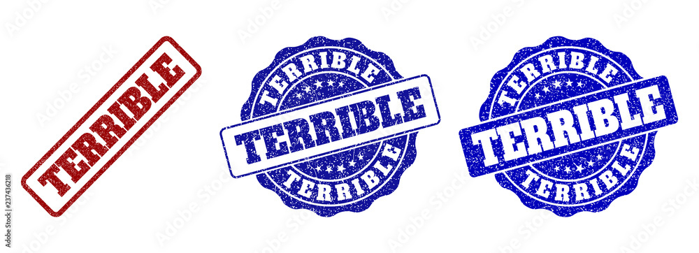 TERRIBLE grunge stamp seals in red and blue colors. Vector TERRIBLE labels with scratced effect. Graphic elements are rounded rectangles, rosettes, circles and text labels.