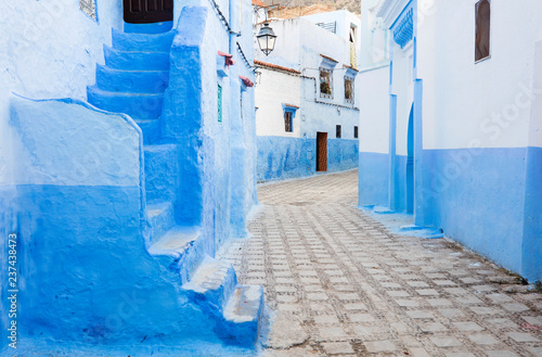alone silent street in blue city Chefchaouen in Morocco © sergejson
