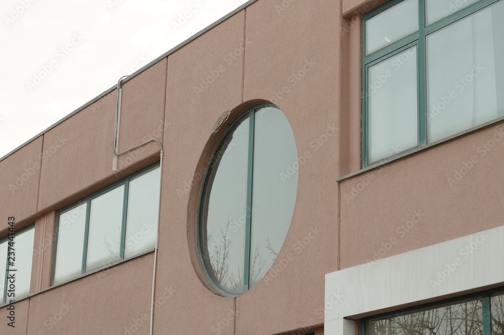 Fototapeta premium Rounded window ofn abandoned building (Pesaro, Italy, Europe)
