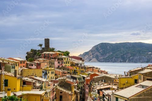 beach streets and colorful houses on the hill in Vernazza in Cinque Terre in Italy  © tmag