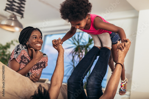 African american family spending time together at home. They are having fun