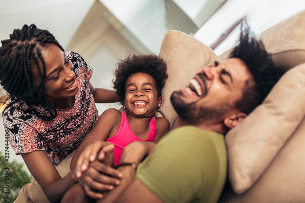 African american family spending time together at home. They are having fun African american family spending time together at home. They are having fun