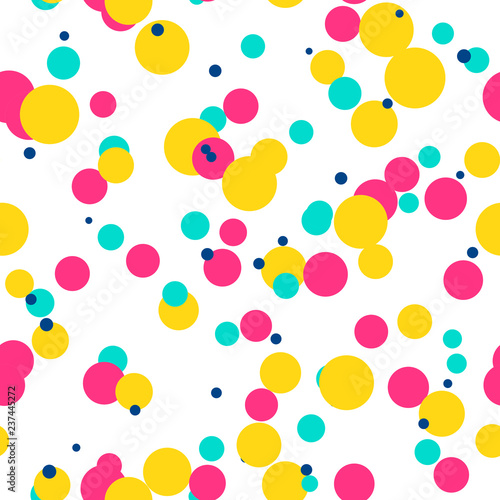 Messy colorful dots on white background. Magenta  blue  yellow festive seamless pattern with round shapes. Grunge dotted texture for wrapping paper  web. Vector illustration.