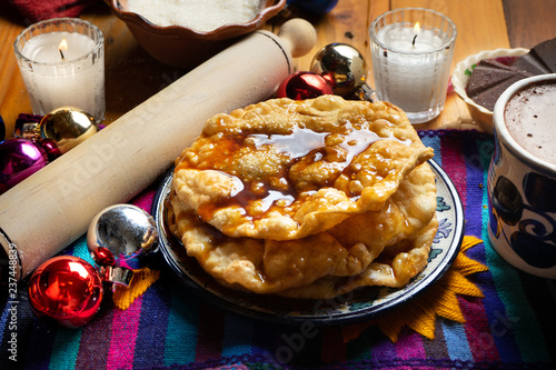 Mexican buñuelos with piloncillo syrup photo