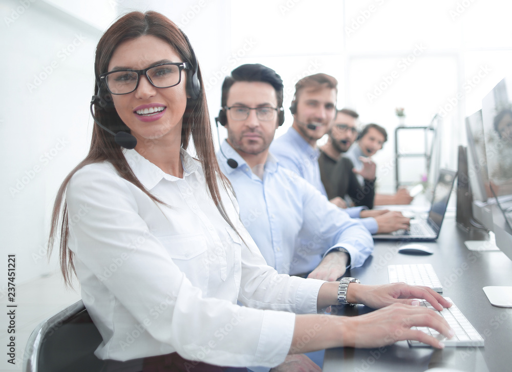 woman operator in the workplace at the call center