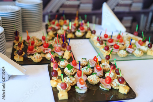 the buffet at the reception. Assortment of canapes.