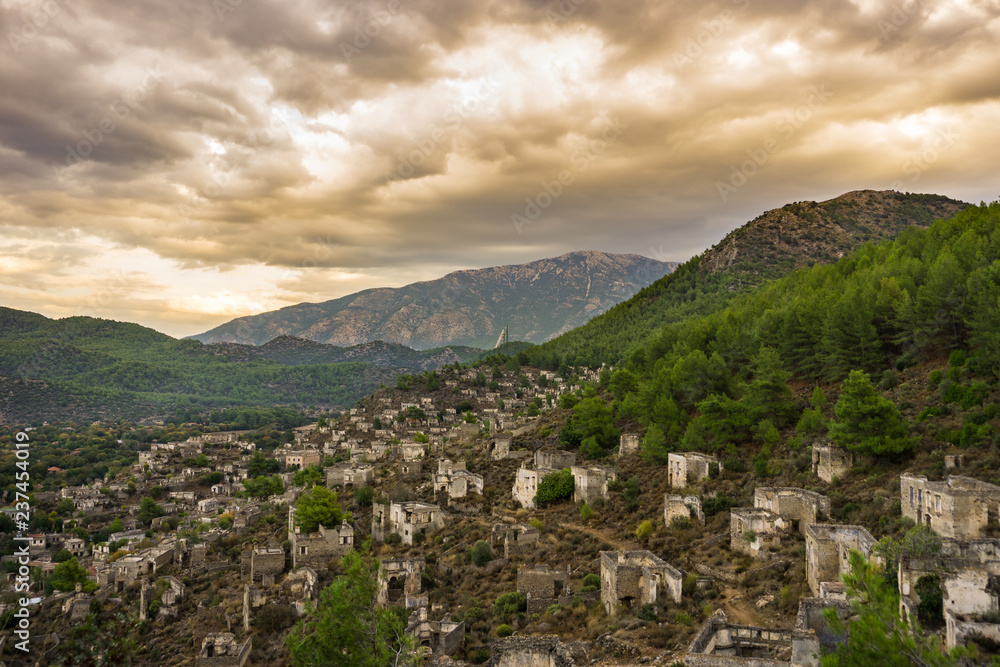Kayakoy houses in historcial Lycian village of Kayakoy, Fethiye, Mugla, Turkey. Ghost Town Kayaköy, anciently known as Lebessos and Lebessus. 3000 Greek life in the 19th century.