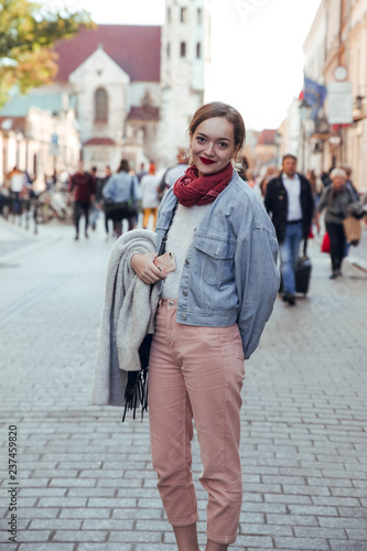 Portrait of blonde girl in Krakow Market Square