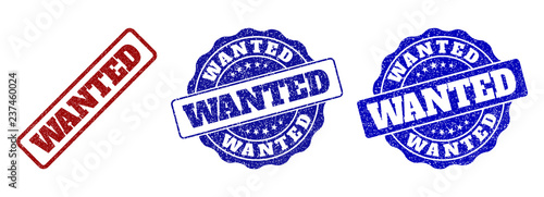 WANTED grunge stamp seals in red and blue colors. Vector WANTED signs with dirty effect. Graphic elements are rounded rectangles, rosettes, circles and text tags. Designed for rubber stamp imitations.