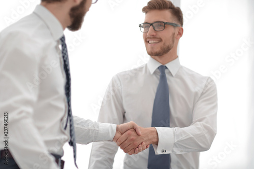 close up.business handshake of business people on a light background