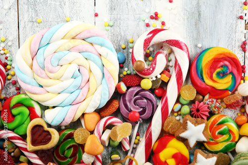 candies with jelly and sugar. colorful array of different childs sweets and treats.