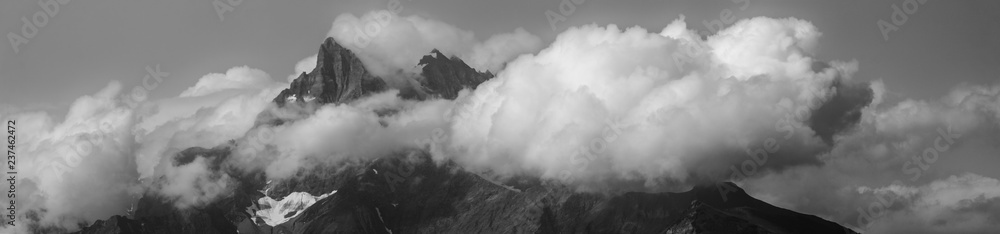 Mountain Peak And Clouds