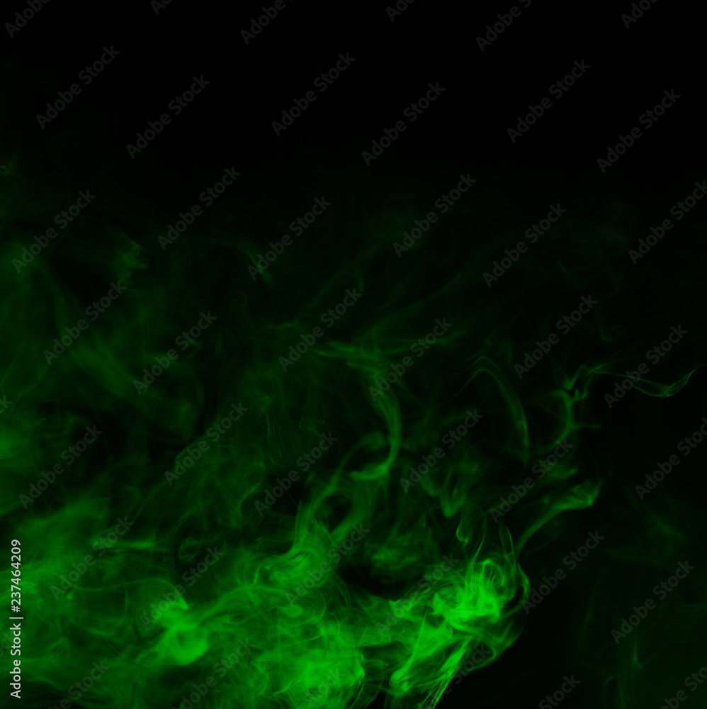 green smoke isolated on black background green smoke isolated on black background