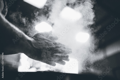 Clapping hands with dust photo