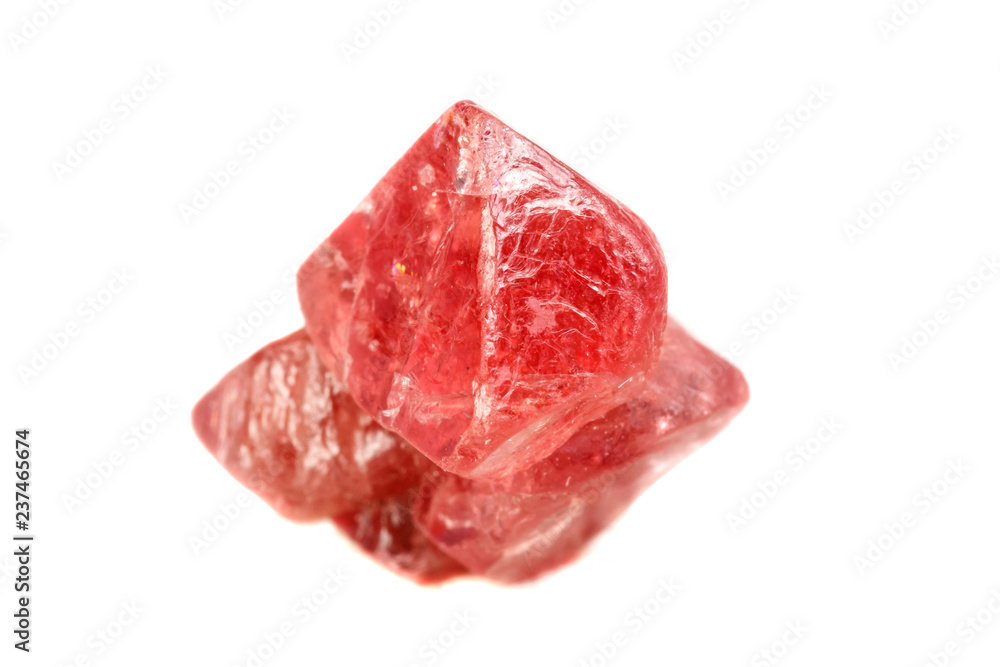 Macro mineral spinel stone on white background Macro mineral spinel stone on white background
