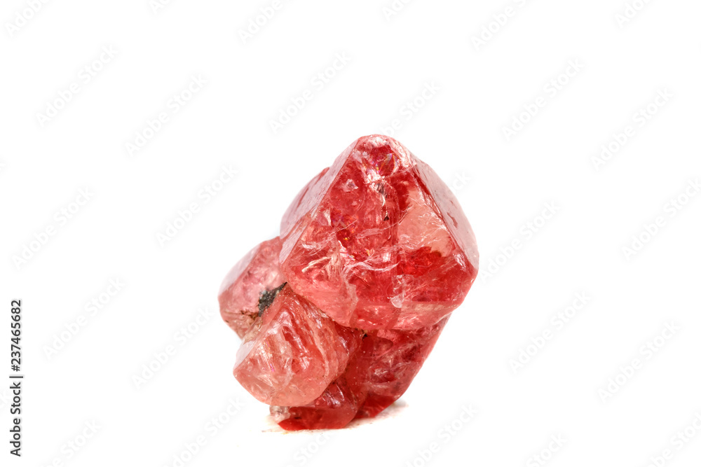 Macro mineral spinel stone on white background Macro mineral spinel stone on white background