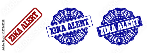 ZIKA ALERT scratched stamp seals in red and blue colors. Vector ZIKA ALERT labels with scratced texture. Graphic elements are rounded rectangles, rosettes, circles and text tags.