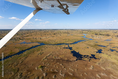 scenic flight above botswana with small bush plane at okavango delta