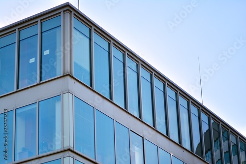 Modern apartment buildings on a sunny day with a blue sky. Facade of a modern apartment building