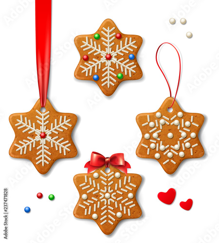 Set of vector Christmas decorations -- vector gingerbread snowflakes, decorated with colored icing, on a red ribbon with a bow, isolated on white background