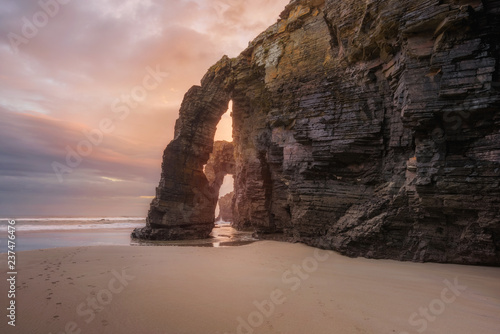 dyllic sunrise landscape in Cathedrals beach, Ribadeo, Galicia, Spain. photo
