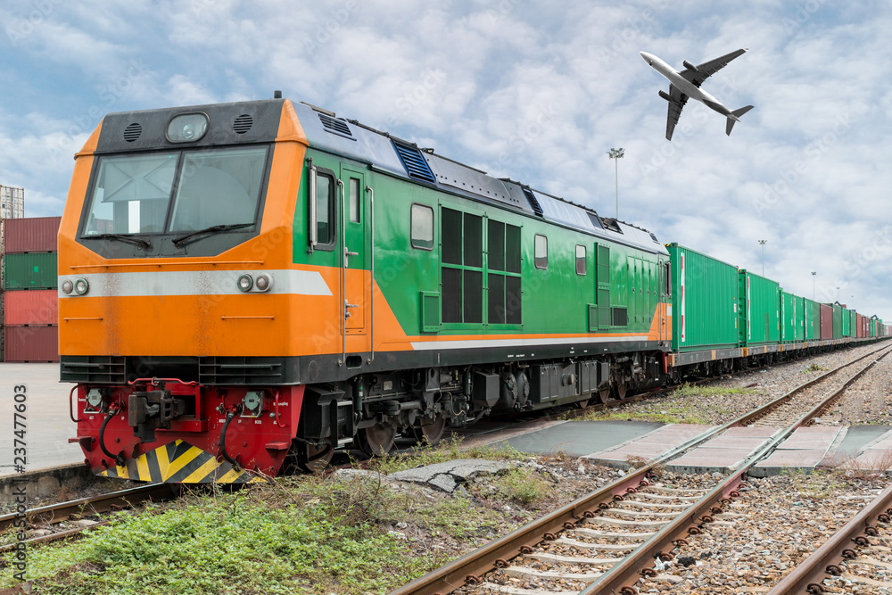 Cargo train platform with freight train container at depot with cargo airplane in port use for export logistics background. Cargo train platform with freight train container at depot with cargo airplane in port use for export logistics background.