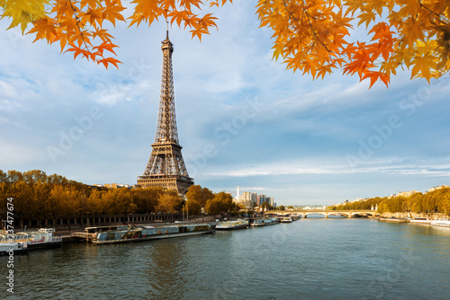 Seine in Paris with Eiffel tower in autumn season in Paris, France.