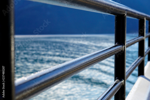 ship railing overlooking water