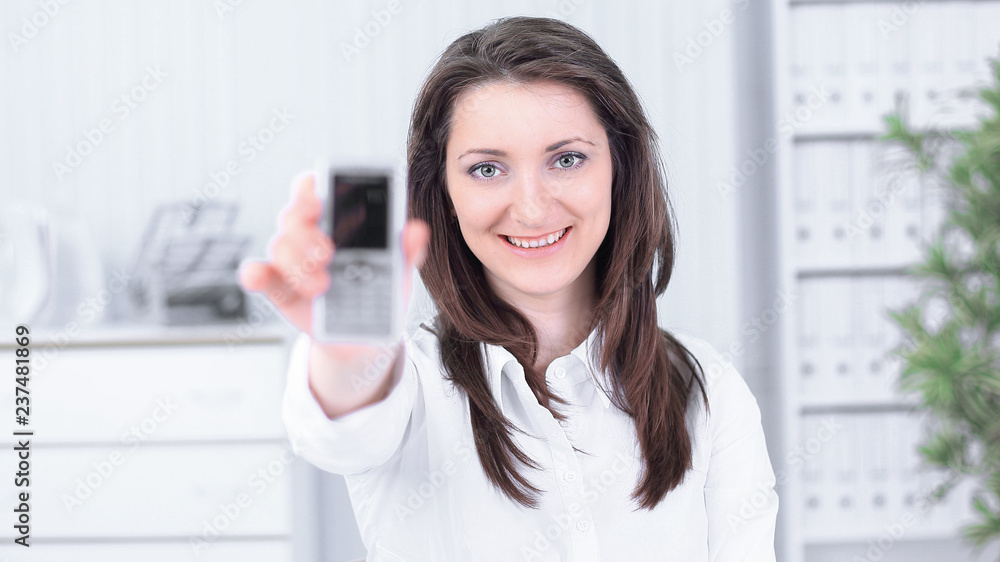 closeup. business woman showing a blank business card closeup. business woman showing a blank business card