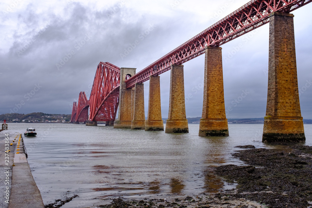 Horizontal View of Forth Bridge from viewed from South Queensferry on stormy day, Queens Ferry, Scotland, UK Horizontal View of Forth Bridge from viewed from South Queensferry on stormy day, Queens Ferry, Scotland, UK