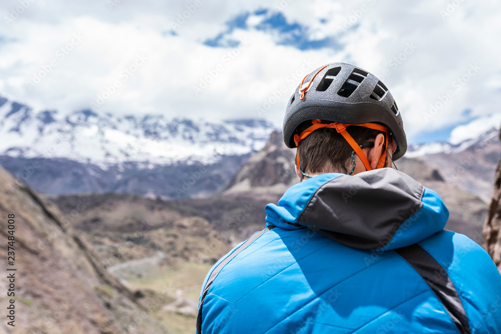 Face expressions while a climber climb a big wall inside the Andes, an