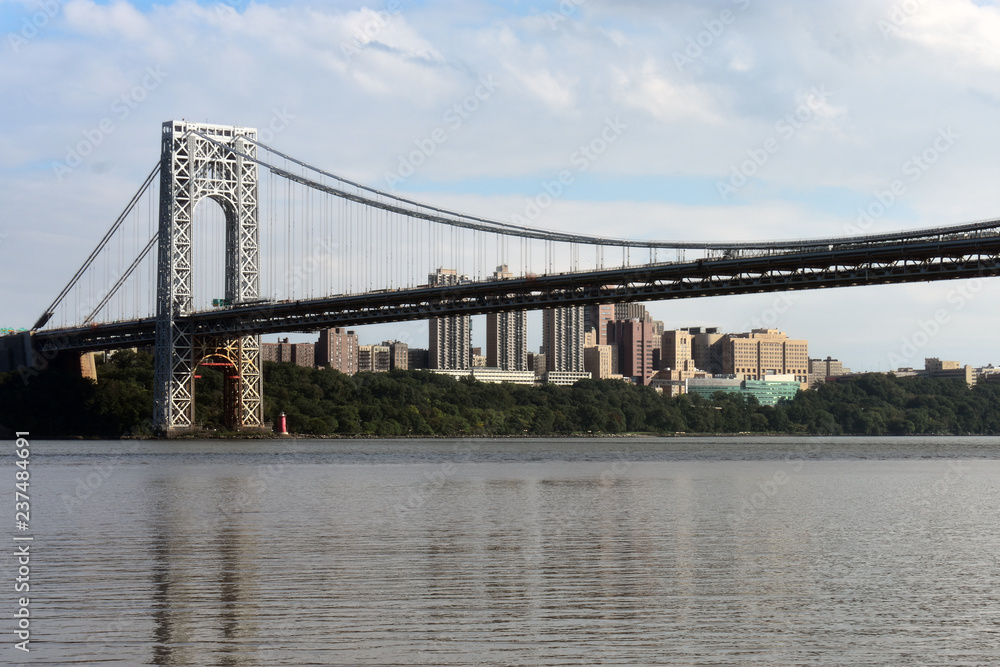 George Washington Bridge with reflection in the Hudson River viewed from Ross Dock picnic area, Fort Lee, NJ