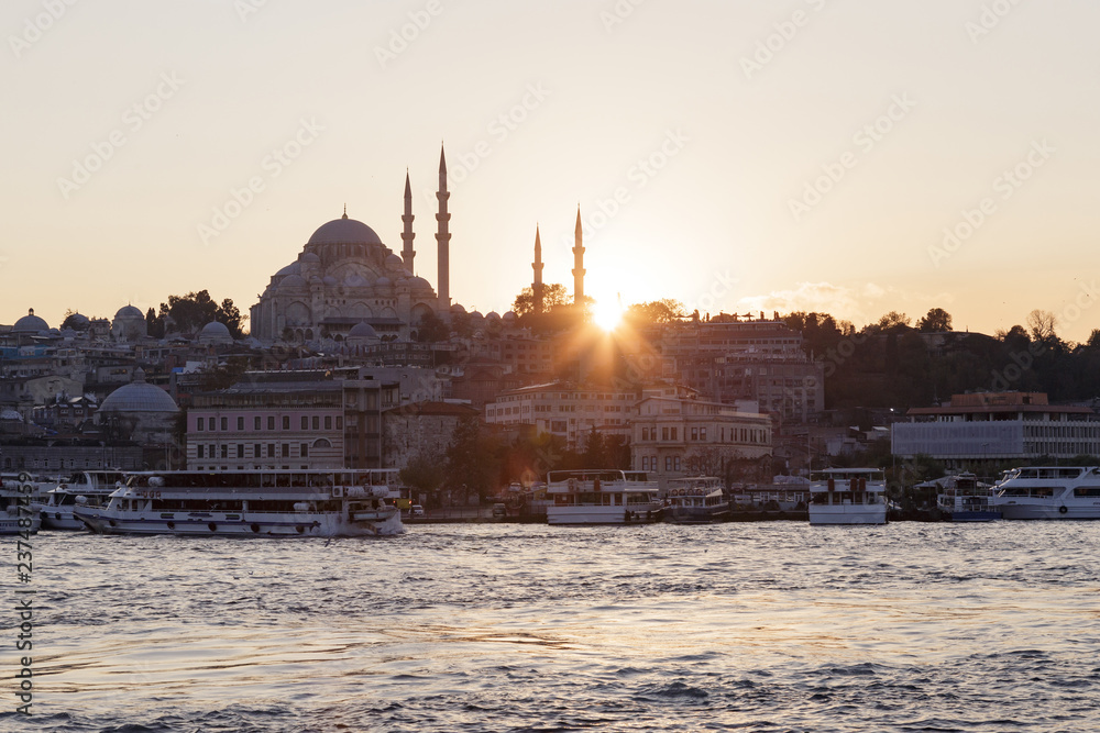 Silhouette of a Mosque, City, and River During the Mesmerizing Sunset